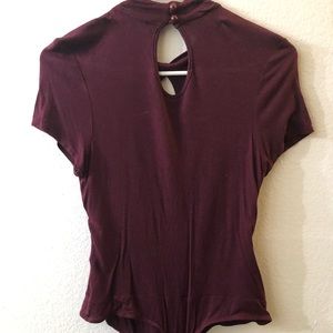 Cute burgundy body suit.